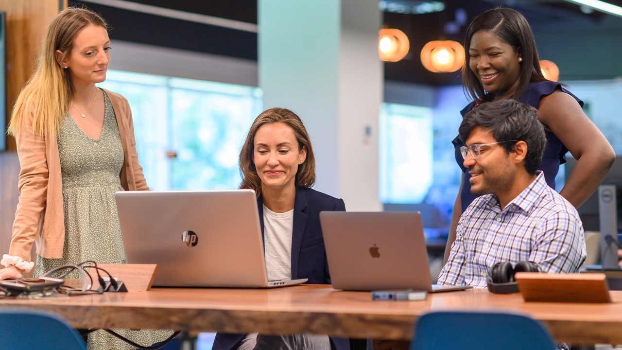 coworkers sharing ideas in 35Mules office space